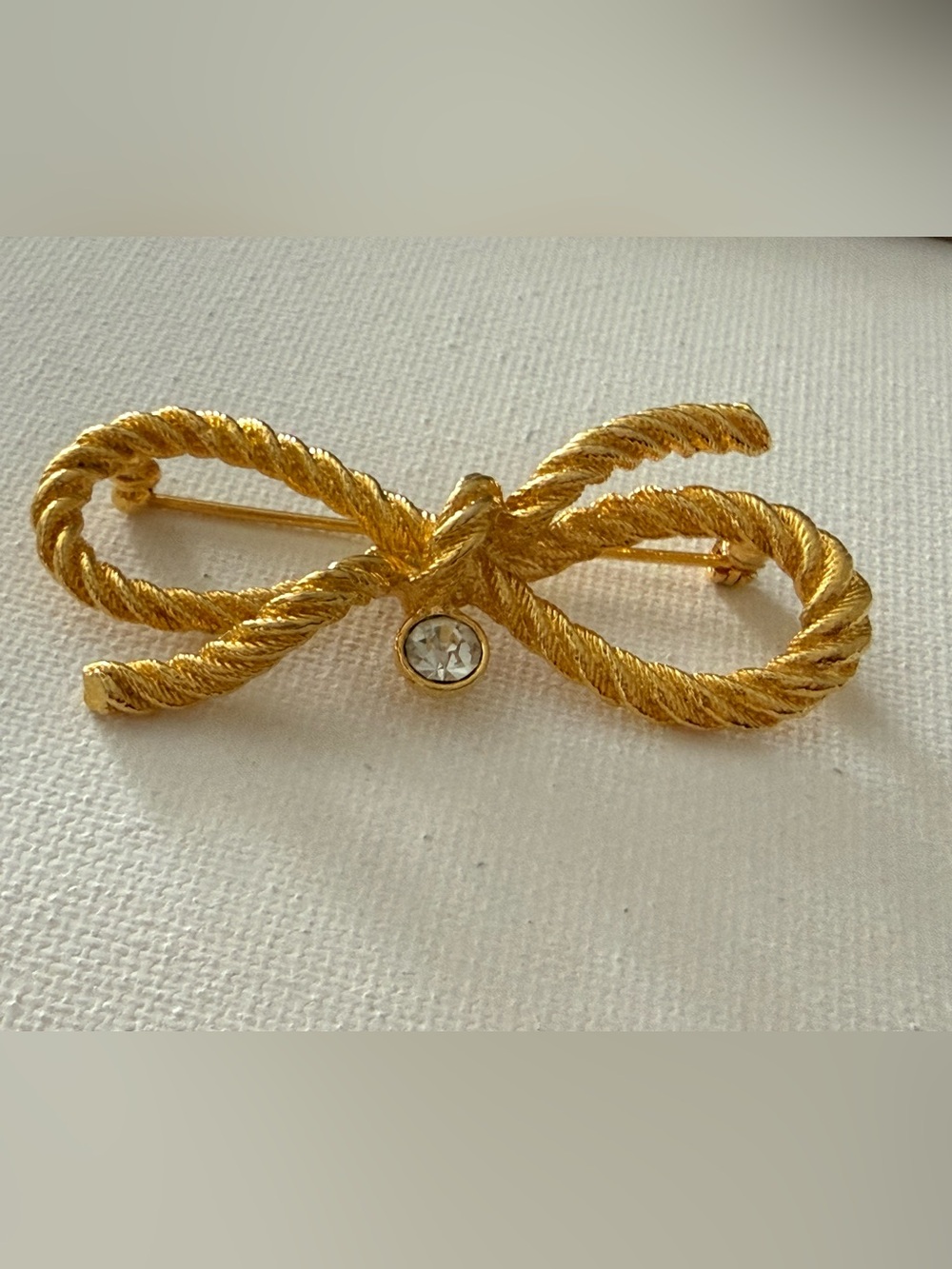 Vintage RJ Graziano Gold-Tone Rope Bow Brooch with Clear Crystal Accent